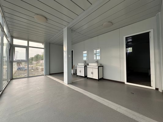 Casa struttura in acciaio galvanizzato pannello sandwich 20ft 40ft contenitore casa moderna prefabbricata piatta confezione casa da soggiorno contenitore