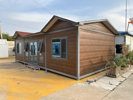 Casa prefabbricata in contenitore in acciaio con grano di legno stabile con pareti e tetto opzionali