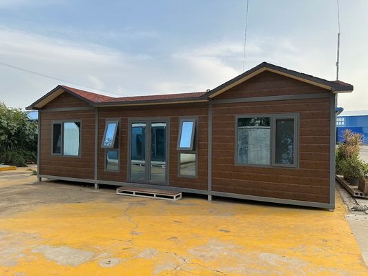 Casa prefabbricata in contenitore in acciaio con grano di legno stabile con pareti e tetto opzionali